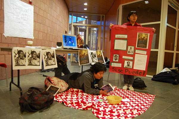 In honor of Cesar Chavezs Birthday, Marisol Casorla 11 and Johana Lozano 11 present posters and YouTube videos of Chavezs speeches while fasting outside the Dining Hall. - Sophie Fajardo