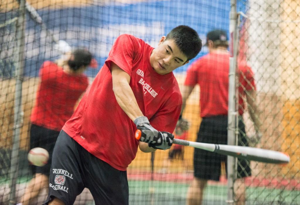 Yuki Kawahara ’15 hits during batting practice on Monday Feb. 24. Photograph by John Brady. 