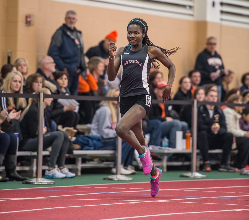 After+tying+her+school+record+in+the+400-meter+dash%2C+Christine+Ajinjeru+%E2%80%9914+hopes+to+qualify+for+Drake+Relays.+Photo+by+John+Brady.+