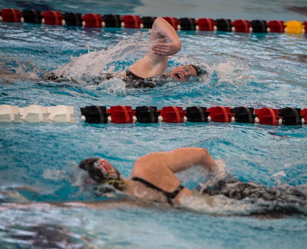 Beth+Gillig+%E2%80%9915+and+Meagan+McKinstry+%E2%80%9916+swimming+in+the+mile+at+the+Last+Chance+Invite.+%0APhoto+by+John+Brady+