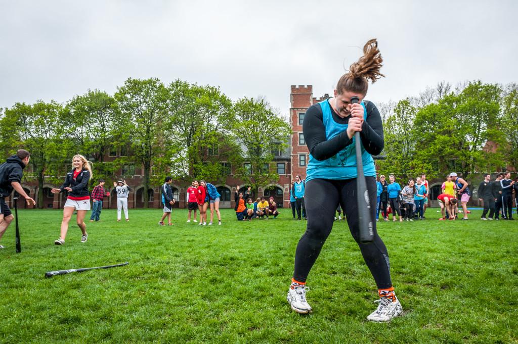 Allie Walker ’15 takes part in the Dizzy Bat relay. 
Photo by Chris Lee