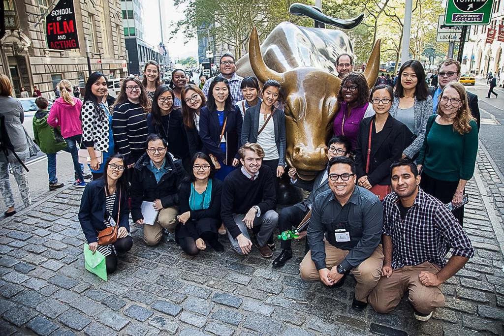 Participants+of+the+NYC+Data+Tour+pose+in+front+of+the+Charging+Bull+in+Wall+Street.+%28Photo+contributed%29