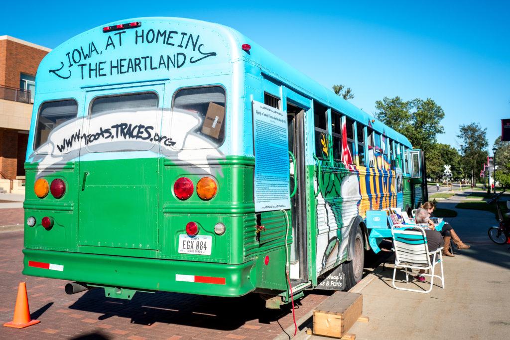 The bus for A Home in the Heartland: Forgotten Stories of how Iowa Got to Be Us is painted differently than the four exhibits TRACES has run previously. The organization has driven Iowas social history around the Midwest. Photo by Xiaoxuan Yang. 