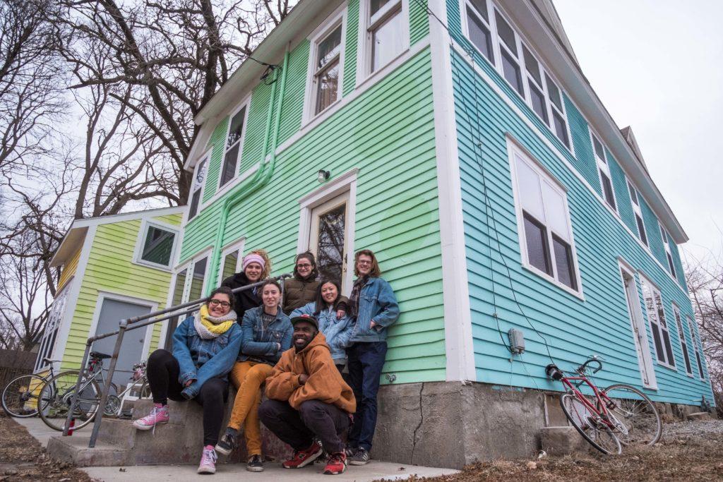 The+seven+residents+of+1007+East+street+pose+outside+their+house.