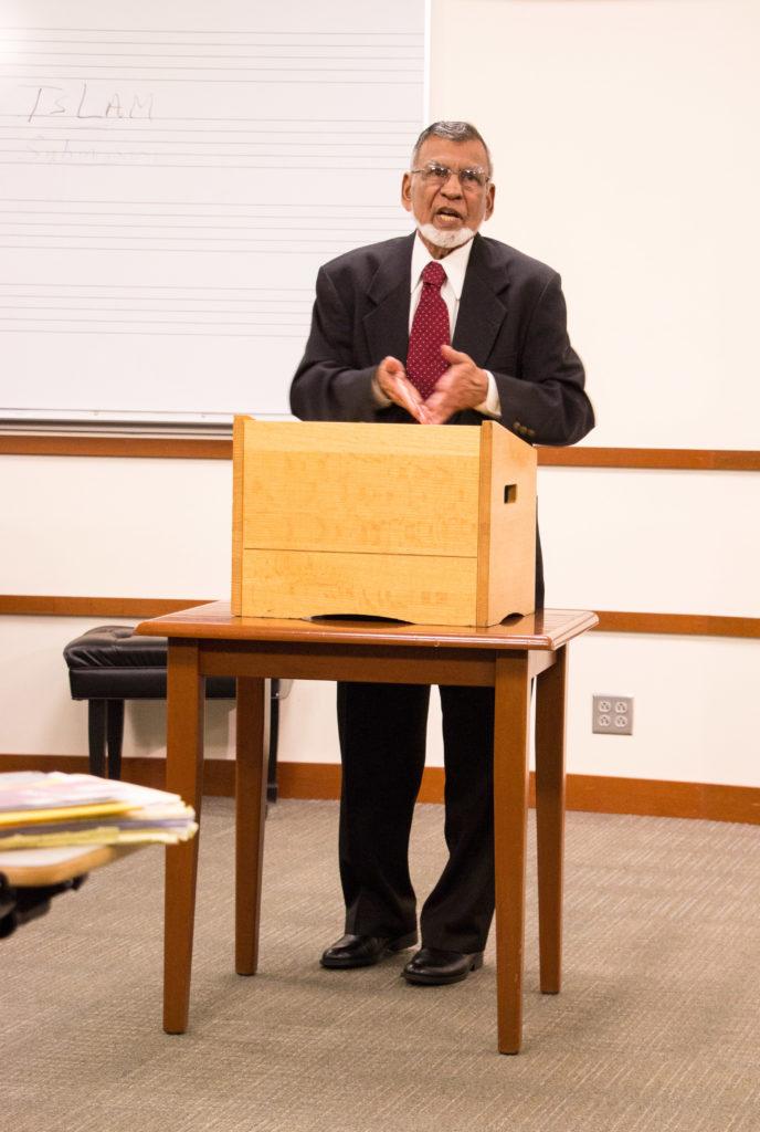 Mohamad Khan, executive director of the Masjid An-Noor Mosque in Des Moines, gave a talk called An Iowa Muslim Perspective on Current Affairs. Photo by Mahira Faran. 