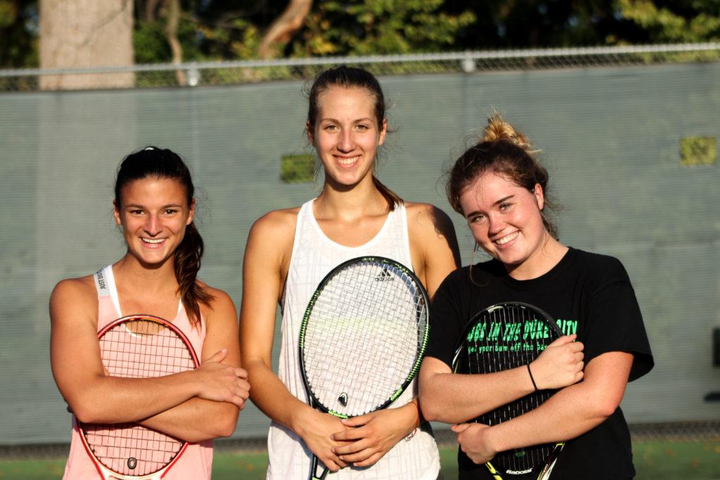 Womens tennis first years Ali Hickey, Milica Cvrkota, and Abby Nielson, all 21, are making an immediate impact. Photo by Mahira Faran.
