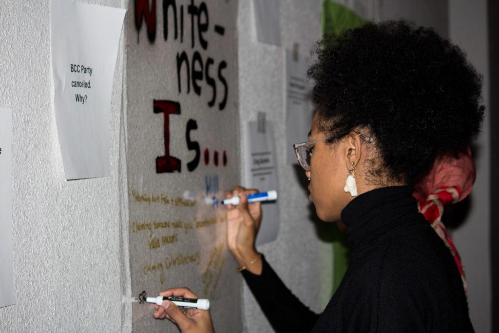 Students participate in an exercise deconstructing whiteness. Photo by Reina Shah.