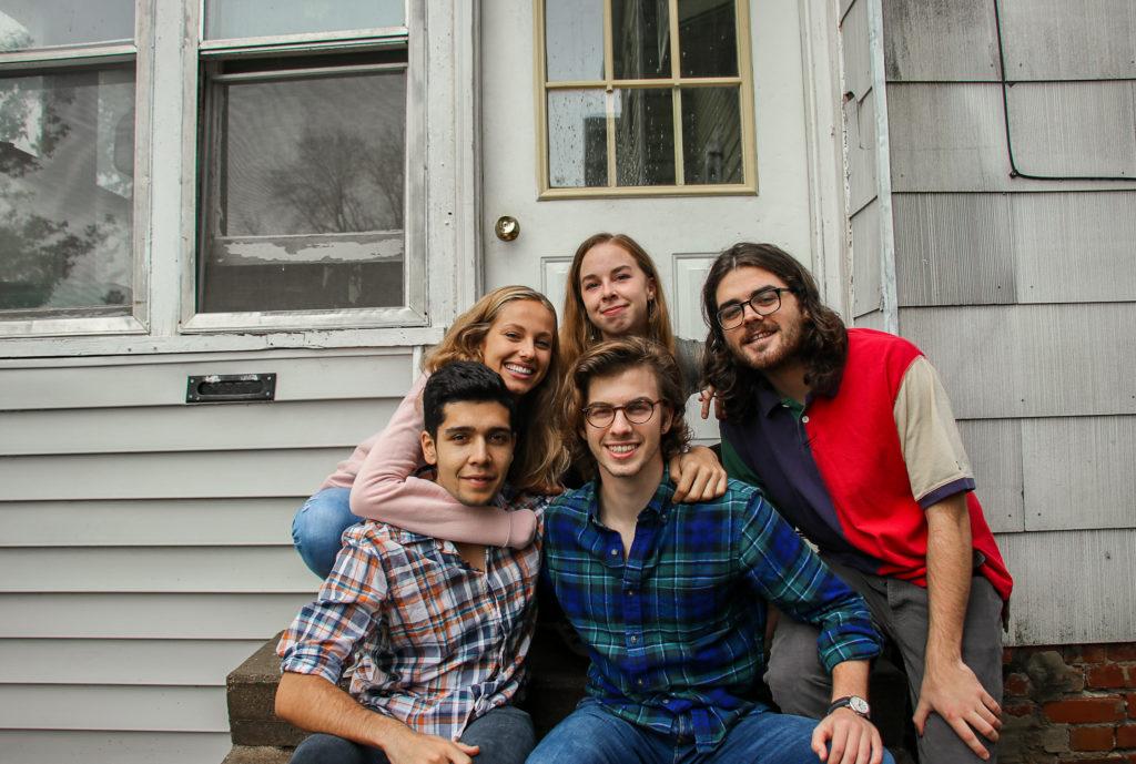 From left to right: Bardan Sigdel 20, Nicolette Musachio 19, Sonia Chulaki 19, Addi Gould 19 and Joseph Knopke 19 seated on their back stoop.
Photo by Mahira Faran