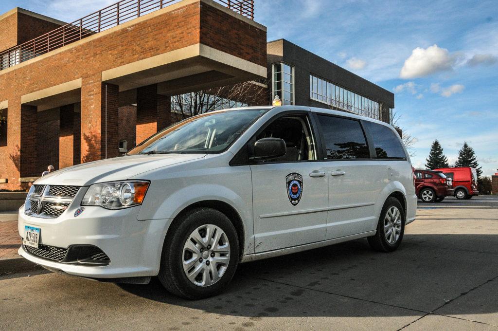 A campus safety van parked outside of the JRC on 8th Avenue. These vehicles are used in the informal courtesy ride service the campus offers.
Photo by Sarina Lincoln