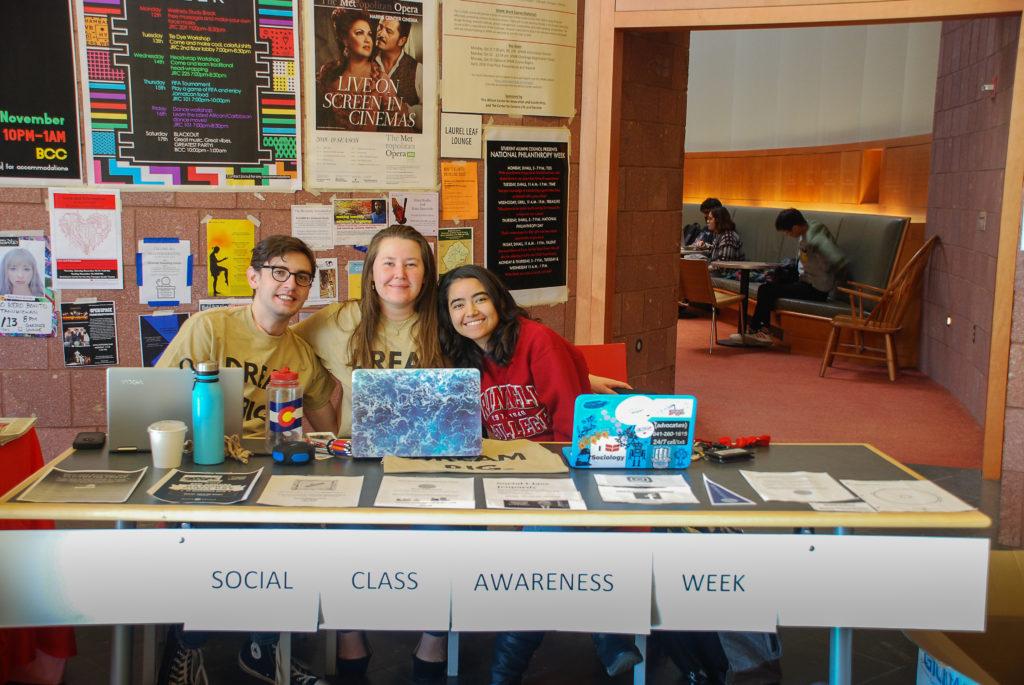 Mitch McCloskey 21, Carina Wilson 19, and Cinthia Romo 19 provide information about SCAW events. Photo by Liz Paik