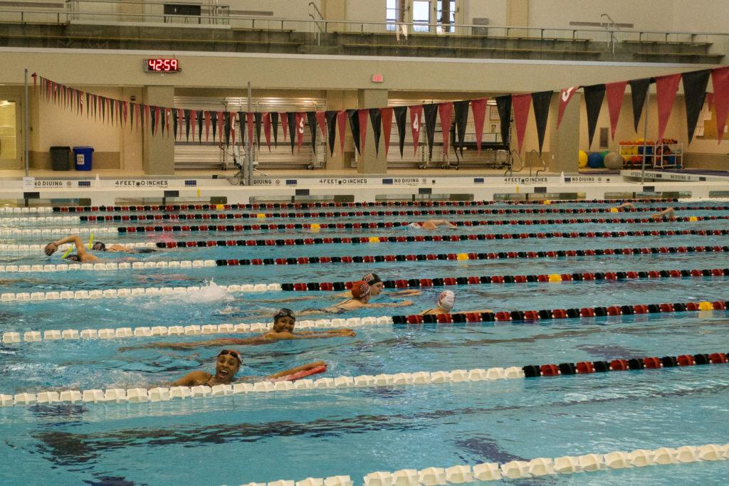 The swim team practices at least five days a week in the Russell K. Osgood Pool, in addition to their dry-land workouts. Photo by Elena Copell.