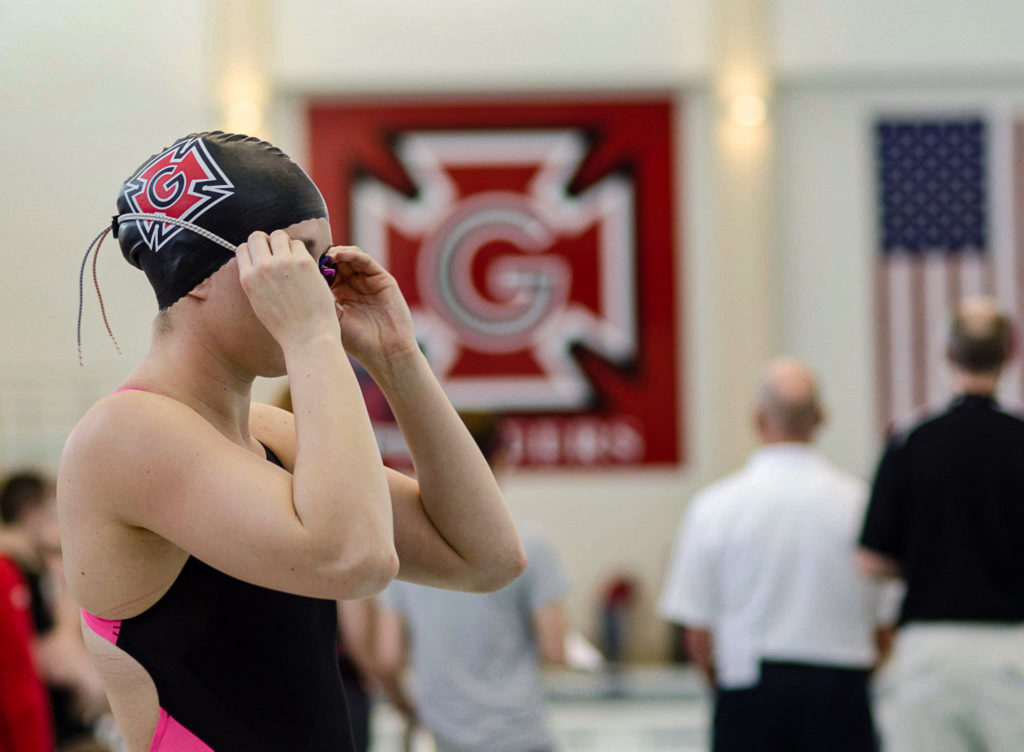Assistant+Swim+and+Dive+Coach+Callie+Eyman+Casey+14%2C+competing+during+her+time+as+a+student+at+Grinnell.+Contributed+photo.