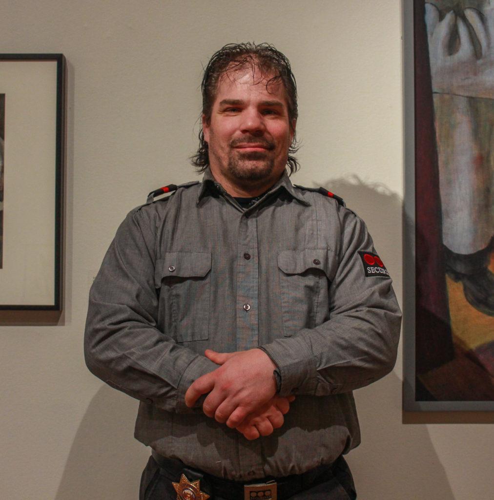 Jeremy Shuey works at the Faulconer Gallery guarding the various works of art that cycle through the exhibits.