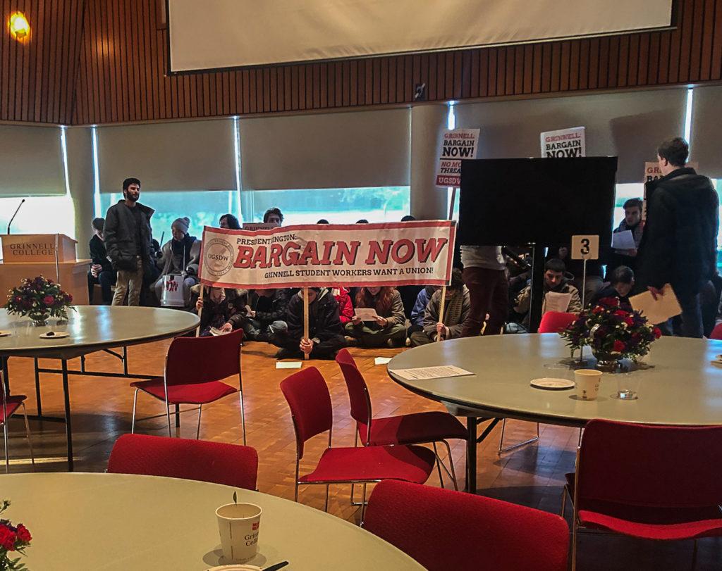 On Feb. 8, UGSDW members protested at the Board of Trustees event, pushing for the College to continue to negotiate with students. 
Photo contributed