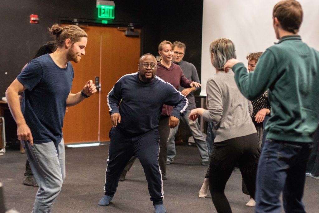Tony Miyambo leads a physical movement workshop, From Character to Ritual. Photo by Sarina Lincoln.