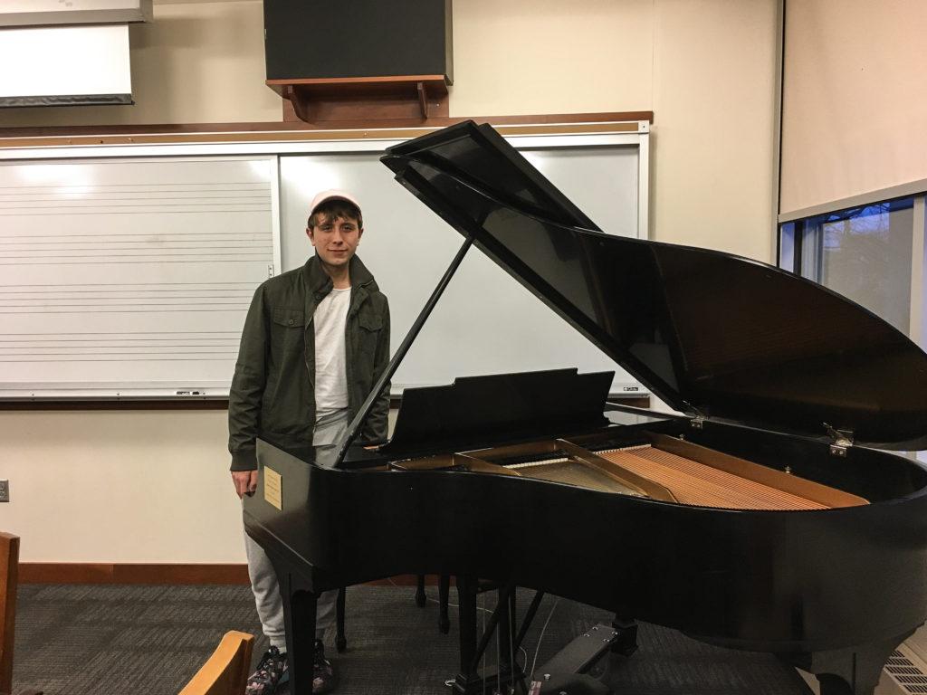 Alec Wood ’19 presented his senior recital on April 2 as the culmination of his piano practice and compositional work at Grinnell College. Photo by Eva Hill.