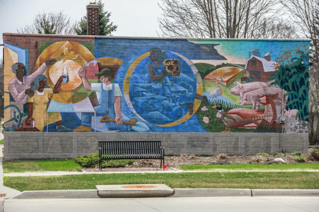 The two proposed new murals will join murals like “Eclipse,” the first mural to be painted in Grinnell, created in 2000 by Dave Loewenstein. Photo by Shabana Gupta.