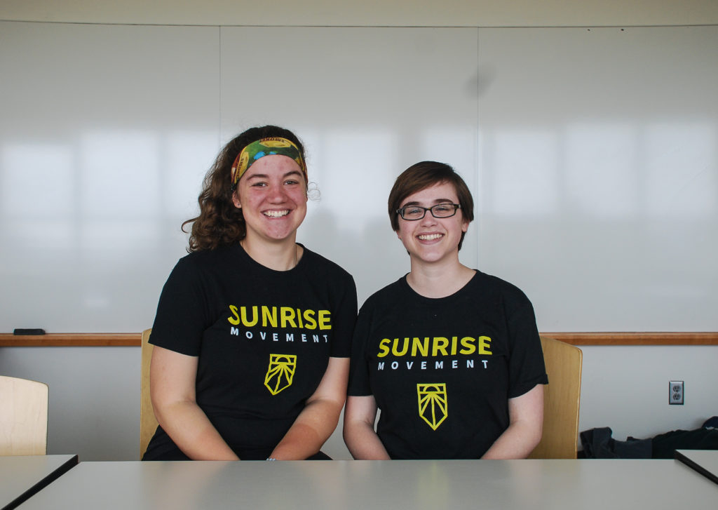 Megan Gardner and Hannah Dorf, both 20, are the leaders of the Grinnell hub for Sunrise, a national movement dedicated to climate change reform. Photo by Liz Paik. 