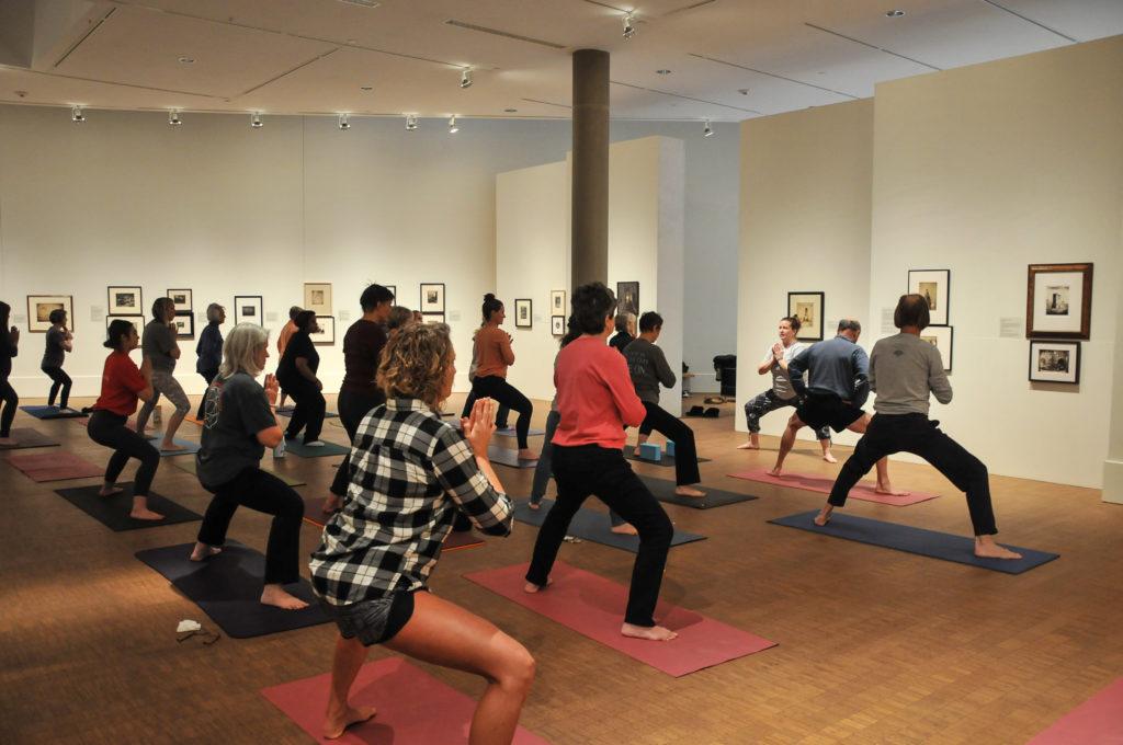 Enthusiastic+students+and+Grinnell+community+members+take+part+in+Monica+St.+Angelo%E2%80%99s+yoga+class+in+Faulconer+Gallery.+