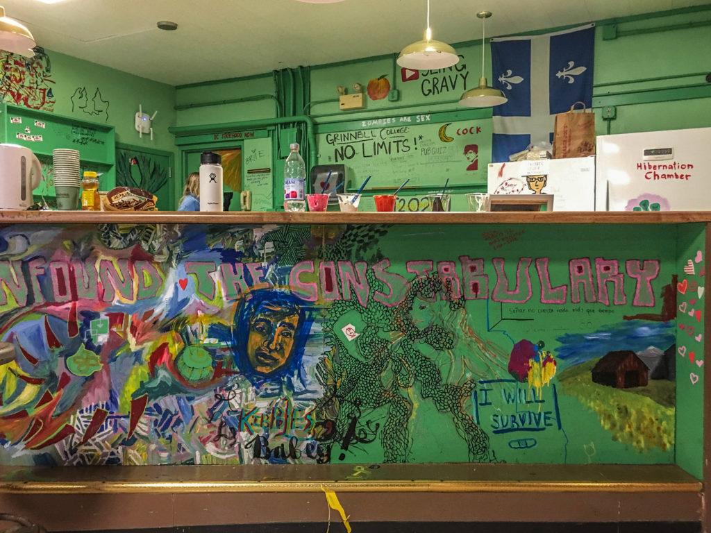 Students spent three hours repainting the iconic walls of Bob’s Underground Cafe on Sunday. The effort was part of a larger movement to get Bob’s operational again and open it for student use. Photo by Liz Paik.