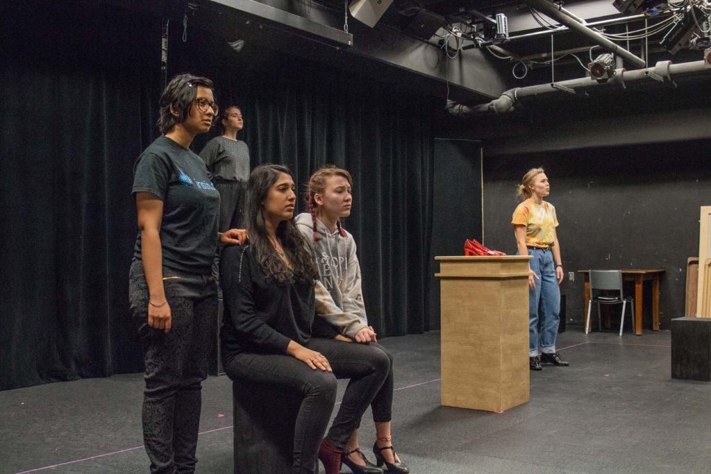Anushka Kulshreshtha 21, Zoe Mahler 22, Indira Kapur 20, Anna Wilson 22 and Katherine Kopp 21 rehearse At the Auction of the Ruby Slippers from the West portion of East, West. Photo by Sarina Lincoln.
