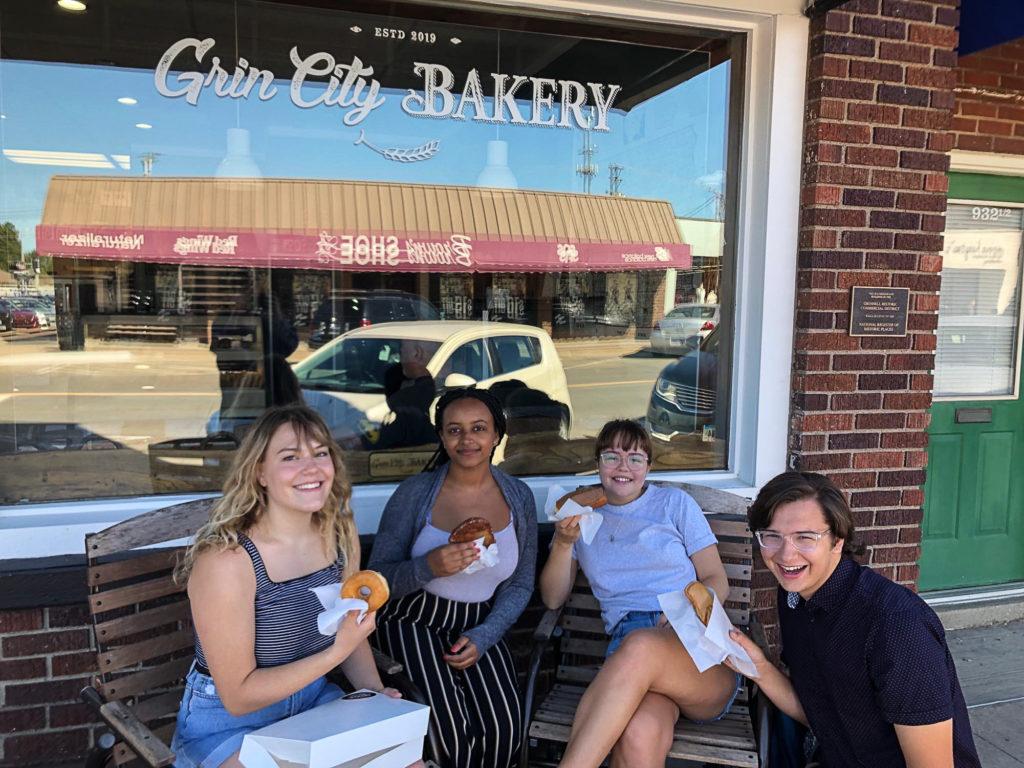 Left to right: Anneliese Stattelman, Eyerusalem Desta, Wini Austin, and Abraham Teuber pose outside of Grin City. Bakery.  Contributed photo.