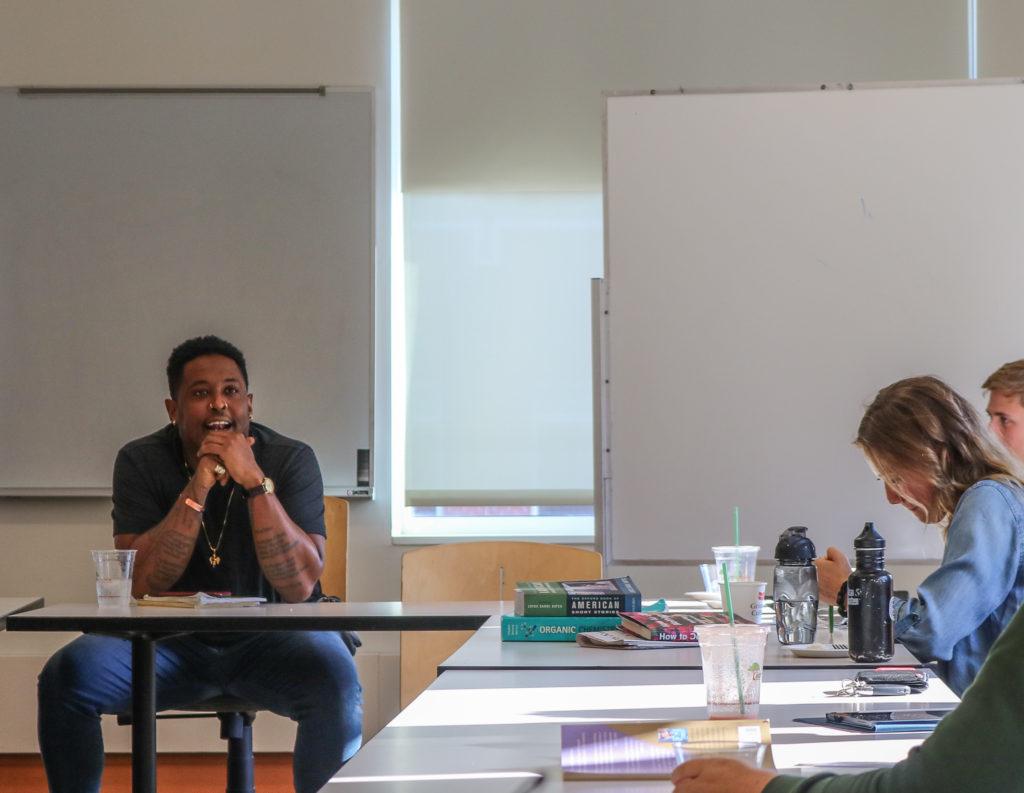 Danez Smith speaks with students at a roundtable on Sept. 3rd. Photo by Isabel Torrence.