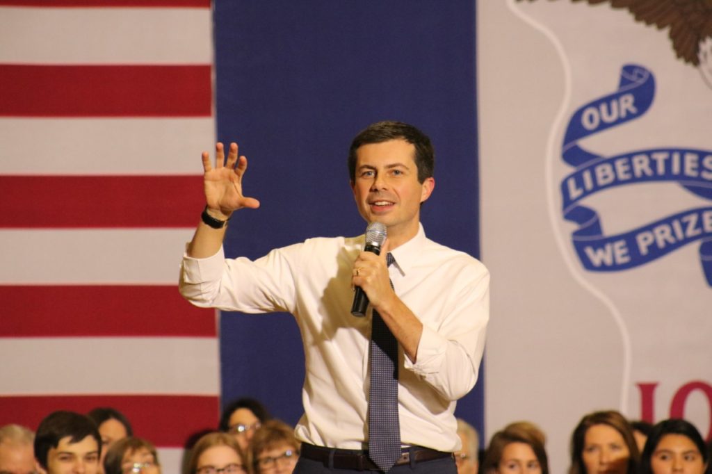 Pete Buttigieg addresses a packed audience in the Harris Center on Friday, Dec. 6. Photo by Andrew Tucker.
