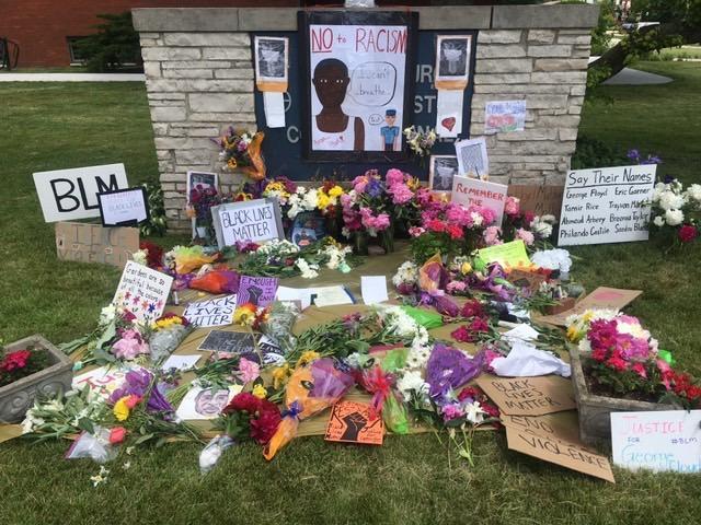 Grinnell community members created a George Floyd memorial outside the Grinnell United Church of Christ, organized by Dr. Kesho Scott. Photo contributed by Ahon Gooptu.