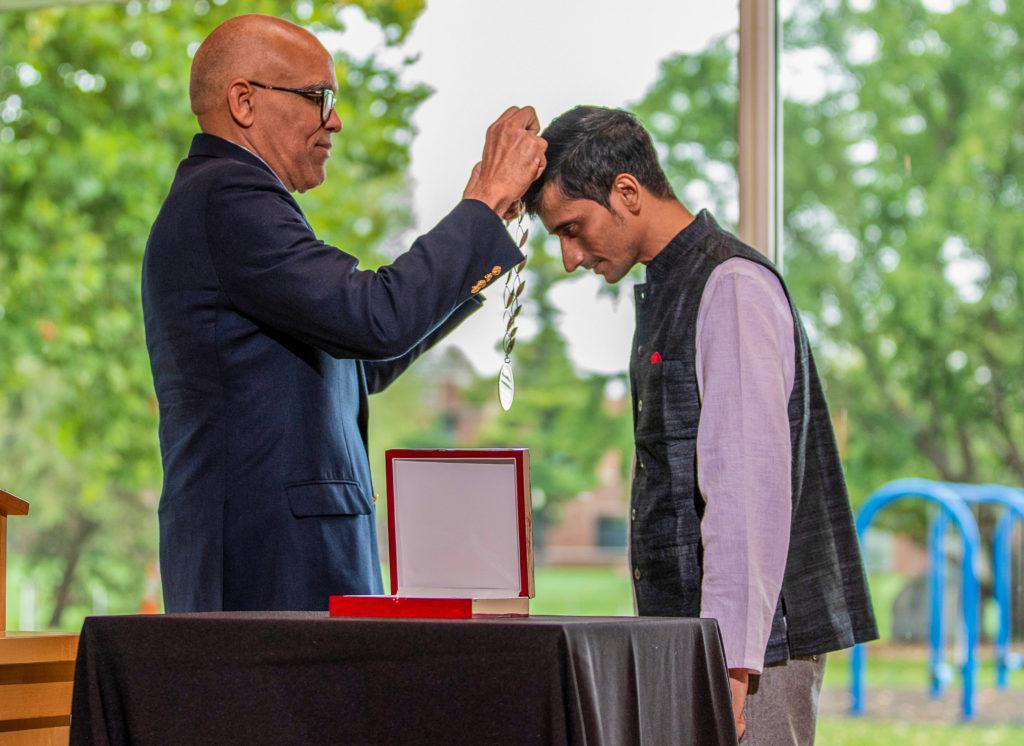 Shafiq R. Khan, founder and CEO of Empower People, is awarded the 2019 Grinnell College Innovator for Social Justice Prize during a ceremony Oct. 1, 2019. Khan and Empower People have been instrumental in the fight to eradicate bride trafficking in North India and in empowering the independence, agency, and leadership of girls and women who have been affected by this issue.
(Photo by Justin Hayworth/Grinnell College)