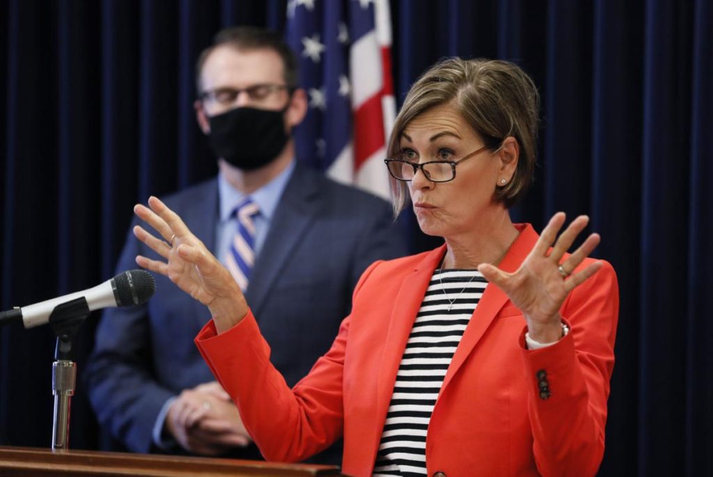 Iowa Gov. Kim Reynolds at an August press conference on the states COVID-19 response. Photo by Charlie Neibergall, Associated Press.