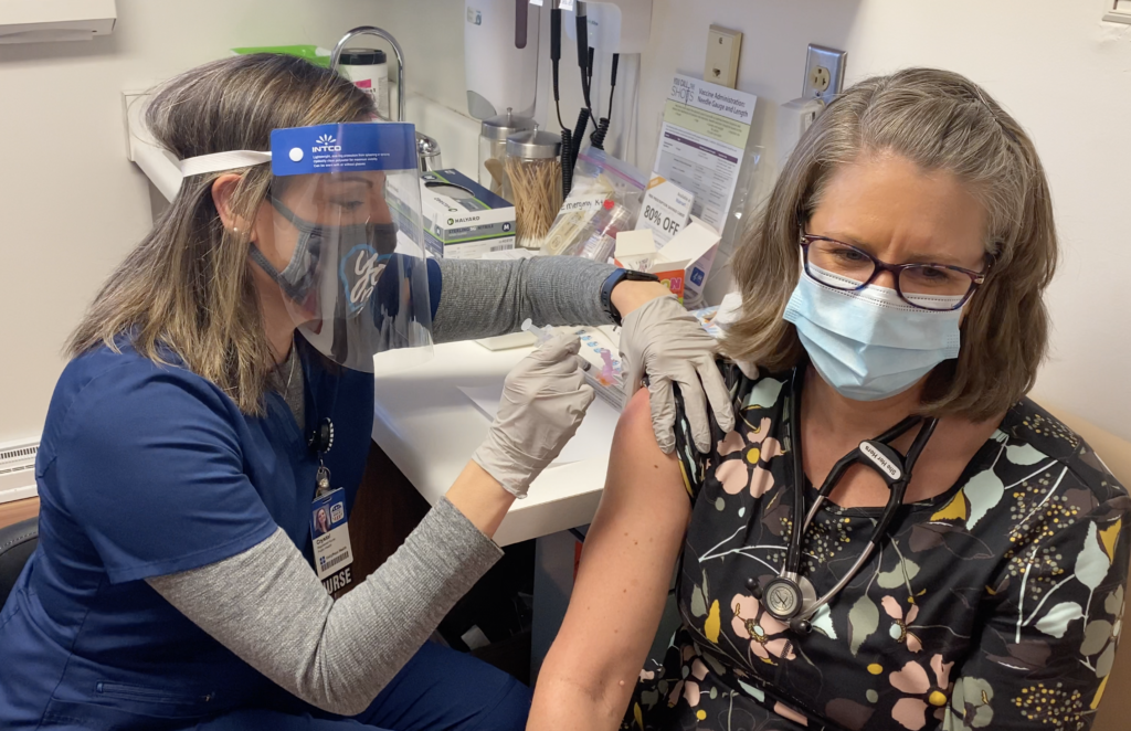 Dr. Laura Ferguson, physician at Family Medicine in Grinnell, receiving her COVID-19 vaccine. Photo contributed by UnityPoint.