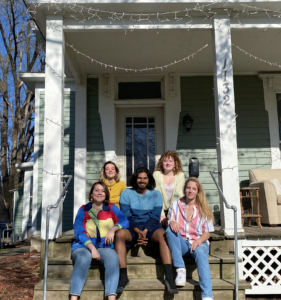 At their house on Broad Street, (from left to right) Tess Kerkhof, Veronica Thomas, Saketan Anand, Lillie Westbrook and Amelia Zoernig, all fourth years, try to keep the spirit of Grinnell alive. Photo contributed by Tess Kerkhof. 
