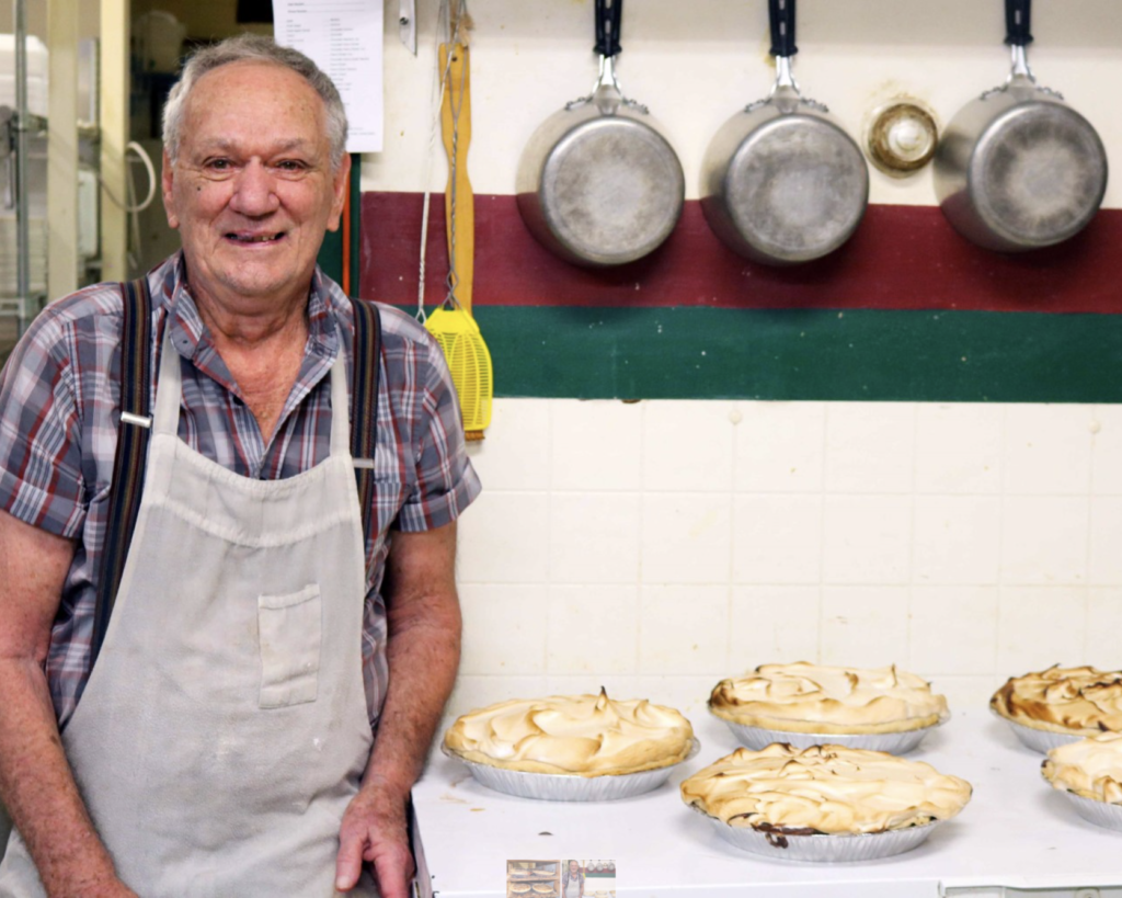 Merle Reitler, co-owner of A & M Cafe, has already made 1,500 pies this year. Photo by Isabel Torrence. 