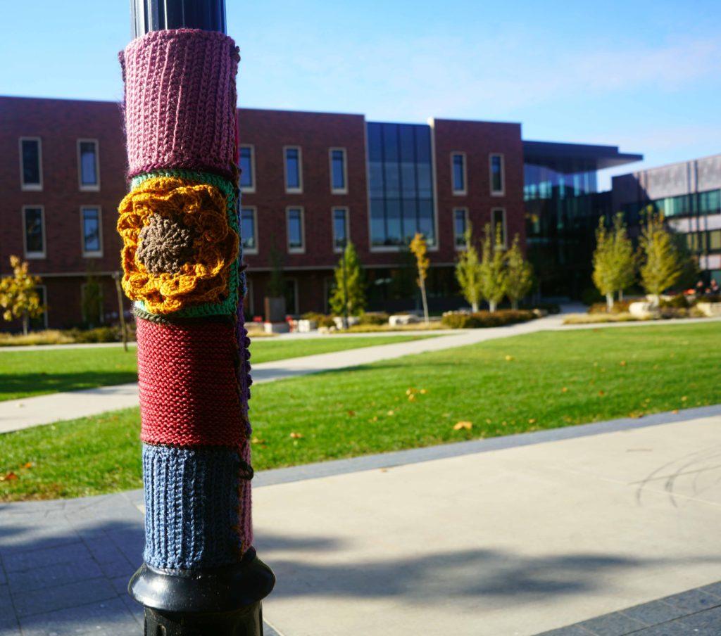 Crochet+yarnbombs+were+planted+on+three+lampposts+and+a+tree+between+Noyce+Science+Center+and+the+Humanities+and+Social+Studies+Center.+Photo+by+Alex+Fontana.+
