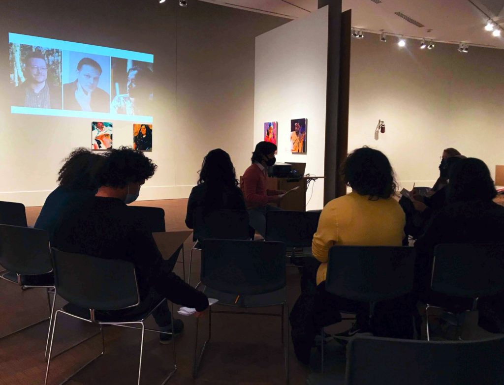 The writing workshop began with Santiago Sanchez reading aloud three short pieces of fiction by queer authors, each work picked for its resonance with a specific work of art in the “Queer/Dialogue” exhibit. Photo by Elisa Carrasco Lanusse. 