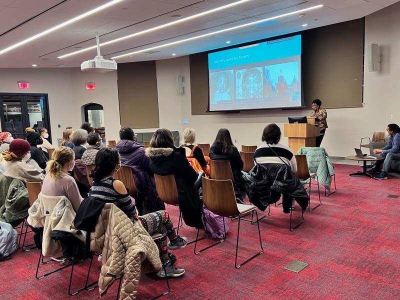Students gather for Dr. Kesho Scott’s presentation about her research in Liberia and work studying the Black holocaust. Contributed by Jazzmine Brooks.