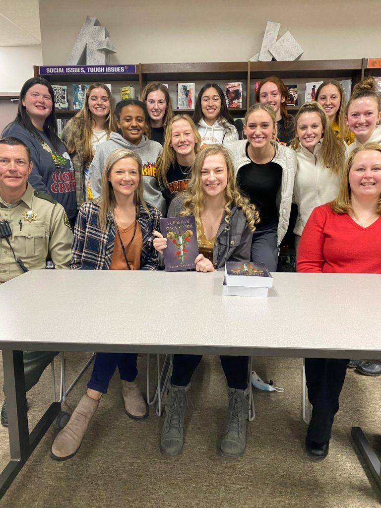 Grinnell High School keeps many copies of Taylor Vander Leests A Clash of Sea and Storms in the library, celebrating the students success. Contributed photo. 