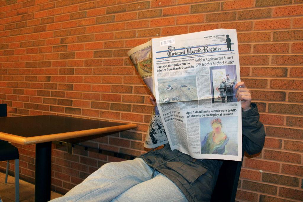The Grinnell Herald-Register, Grinnell’s town newspaper, maintains regular readership of about 2,200 within Poweshiek County even as local papers shut down nationwide. Photo by Nina Baker.