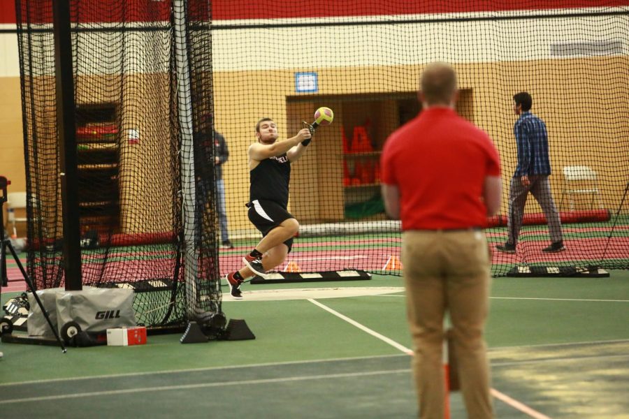 Ian Clawson `26 (above) broke the school record for the weight throw with a 54-5 1/12 toss at the Midwest Conference Indoor Track and Field Championship on Feb. 24-25. He placed third in the event.