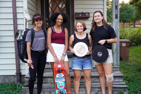 The residents of 1021 High St. stand in front of their plant-filled home. From left to right: Amanda Ramirez `23, Zoe Robinson `23, Mia Overvoorde `23 and Samantha Morrison `23.5.