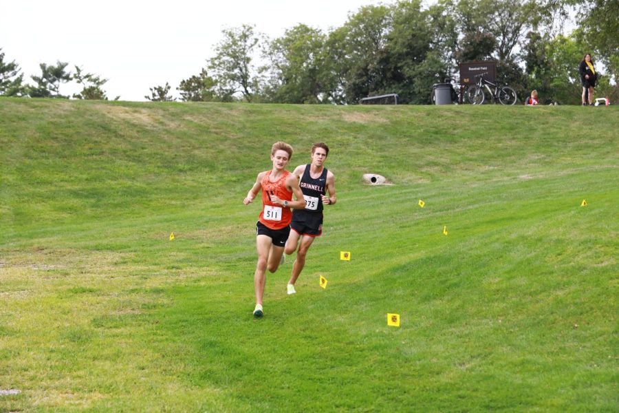 Brian Goodell `24, right, finished 14th out of 127 men’s runners.