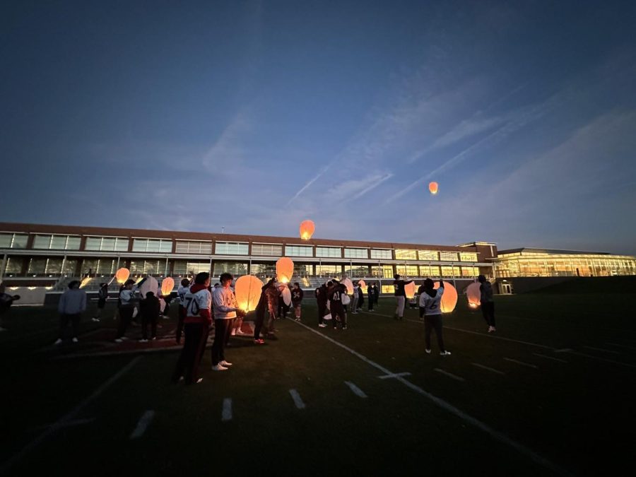 Davis+Cooper%E2%80%99s+coaches+and+teammates+gathered+on+Nov.+7+on+Rosenbloom+Field+to+remember+their+friend+and+release+lanterns+into+the+sky.