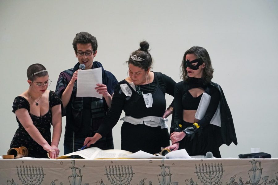 From left: Zoe Nechin `25, Theo Deitz-Green `23, Rabbi Sarah Brammer-Shlay, and Livia Stein Freitas `25 perform a spiel.