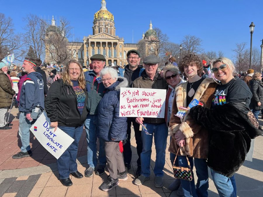 Grinnell students, staff, faculty and community members protested for trans rights on the steps of the Iowa State Capitol building in Des Moines. 