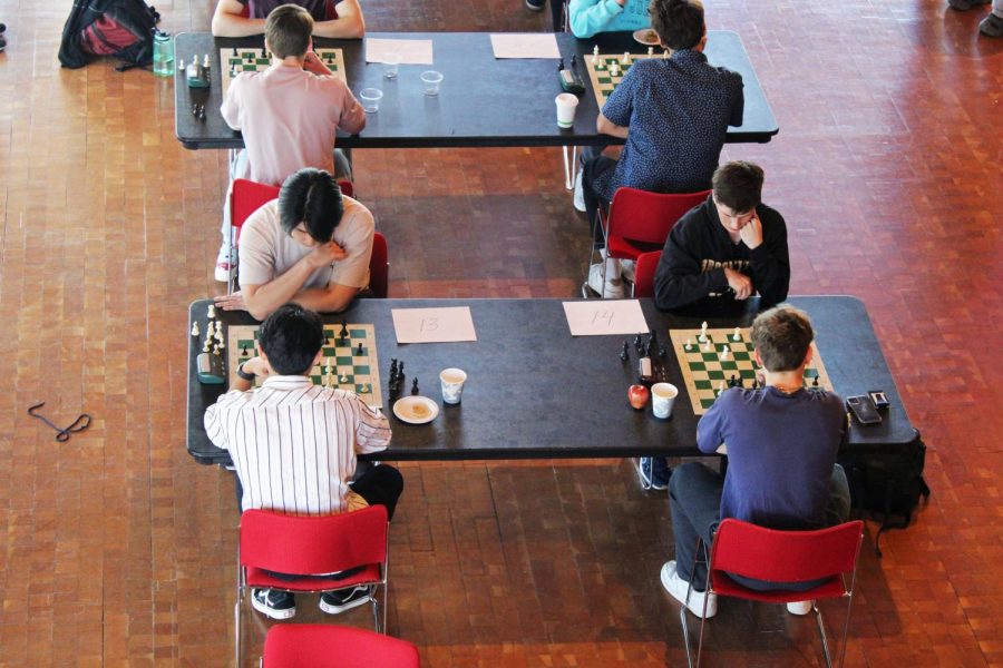 Participants playing their matches during Chess Club’s tournament on April 8.