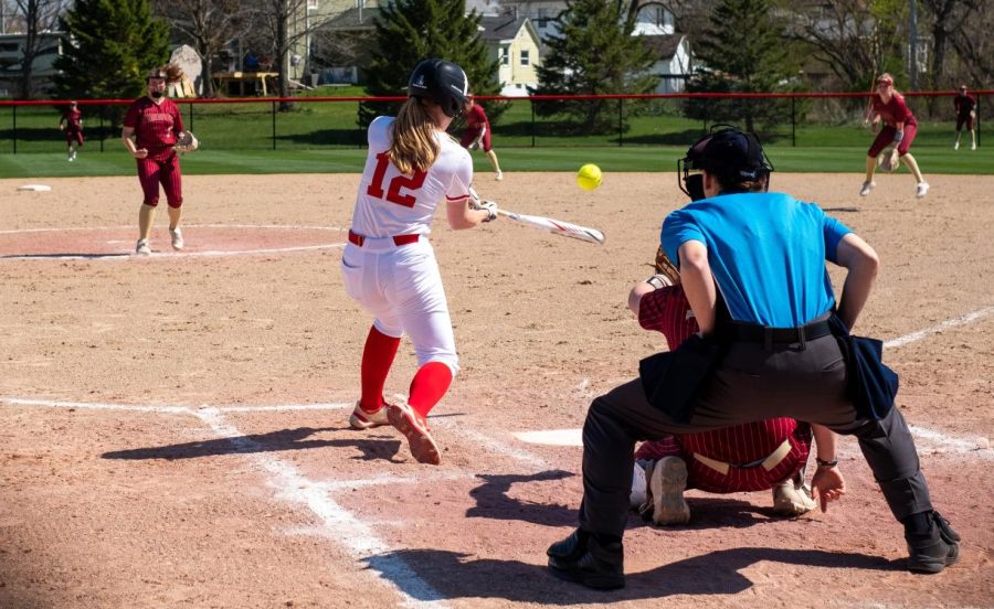 Emma Nelson `23, outfielder, bats against Coe College on April 24.