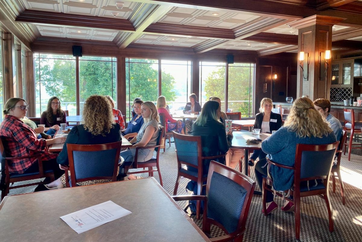 Around 20 women attended the Thursday, Sept. 21 Connecting for Women breakfast networking event in the lounge of Grinnell Colleges golf course. 