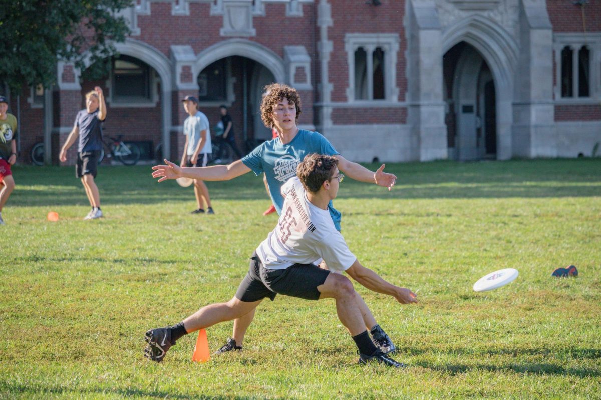 Members of the open frisbee team playing on MacEachron Field (Mac) at their Sept. 27 practice. The open and womens teams practice there every Monday, Wednesday, and Friday from 4:15 p.m. to 6:30 p.m.