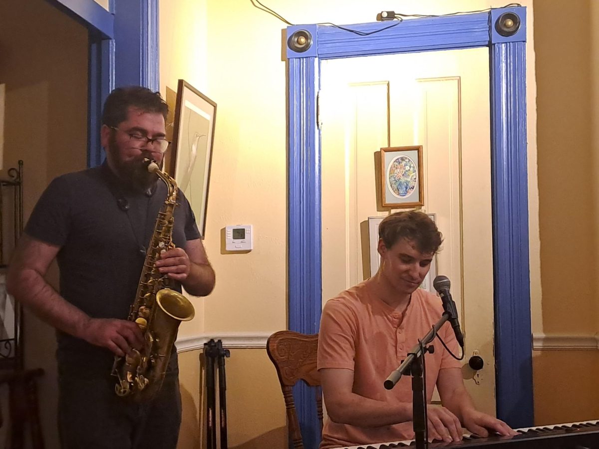 From left: Mark Laver and Erik Jarvis `12 performing in the dining room of the restaurant Relish at 834 Park St.